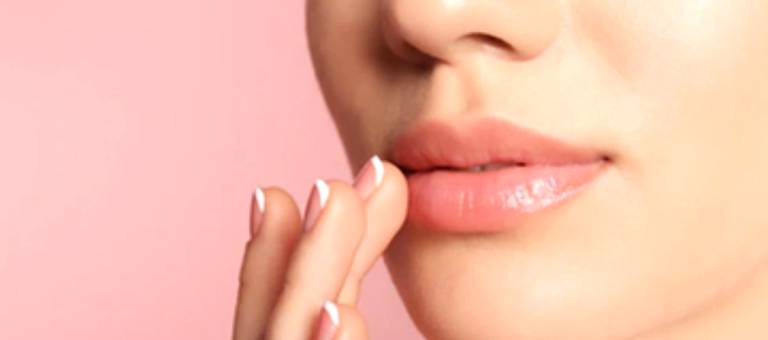 The right way to care for your lips to restore their natural pink color.