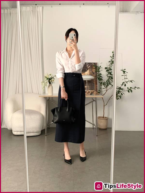 images 10 of Even the simplest black skirt can look chic and sophisticated when paired with these four types of tops.