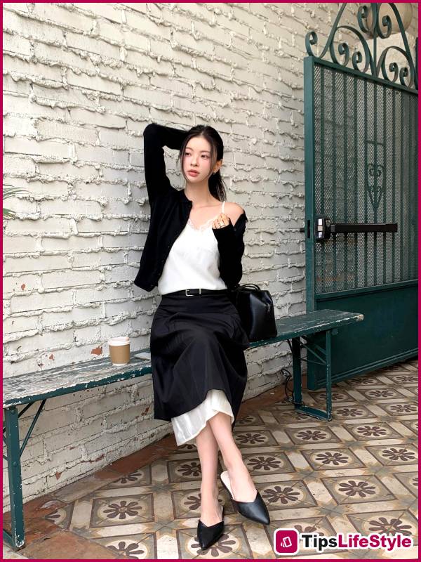 images 4 of Even the simplest black skirt can look chic and sophisticated when paired with these four types of tops.