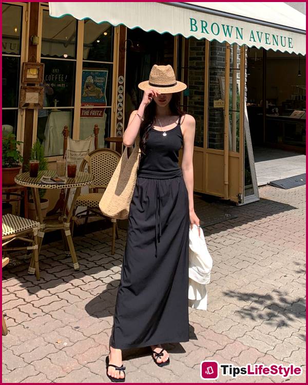 images 5 of Even the simplest black skirt can look chic and sophisticated when paired with these four types of tops.