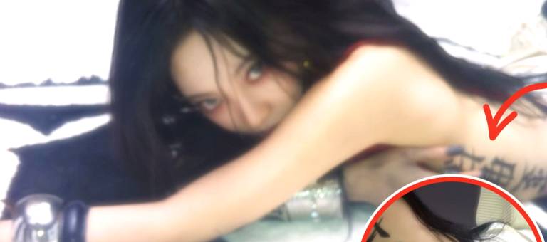 The 2002-born female singer showed off a revealing photo but quickly deleted it because of a huge Chinese character running down her side?