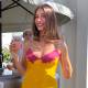 Hailey Bieber flaunts a revealing nightgown in the desert, earning her the title of 'First Lady' at this year's Coachella.