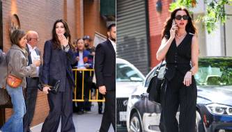 The secret to wearing trousers elegantly without being boring, like Anne Hathaway at age 44.