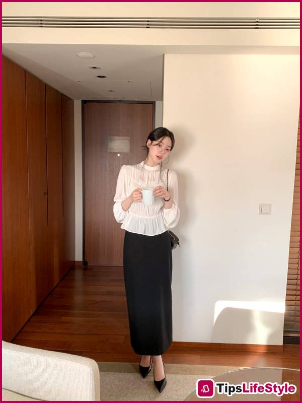 images 1 of 4 types of tops that pair beautifully with a black skirt: simple yet stylish.