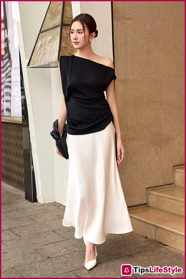 images 2 of White satin skirts are trending in 2026: The minimalist black and white combination is still powerful enough to elevate your style.