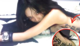 The 2002-born female singer showed off a revealing photo but quickly deleted it because of a huge Chinese character running down her side?